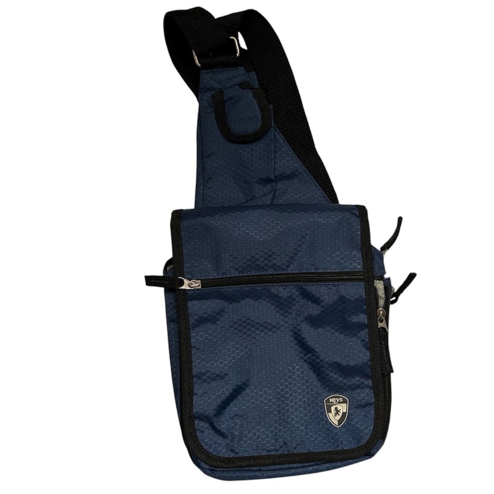 HEYS Travel Mate V3 Crossbody Utility Bag in Blue